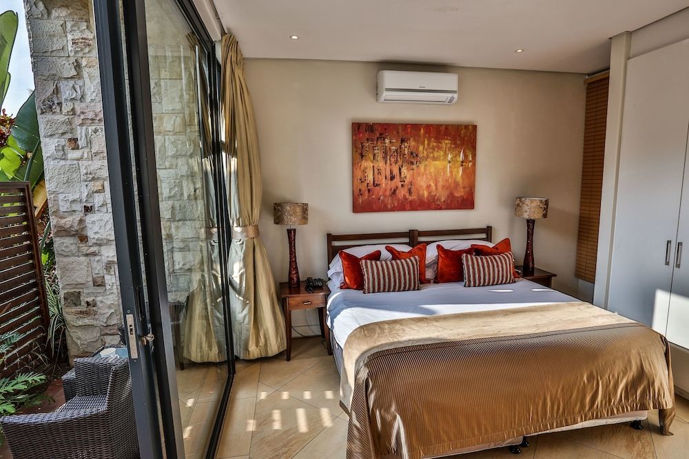 Canelands Beach Club Standard Room, Balcony, Garden View 2