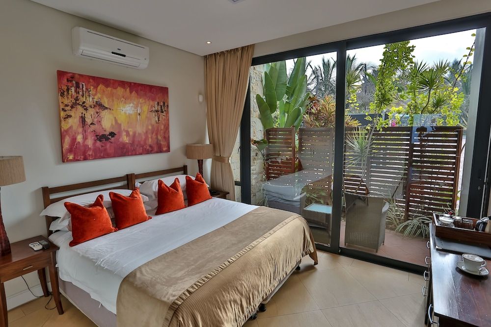 Canelands Beach Club Standard Room, Balcony, Garden View 4