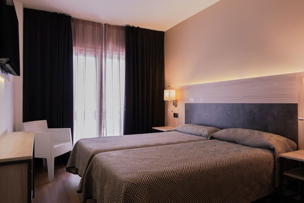 Triple Room (2 Adults + 1 Child)