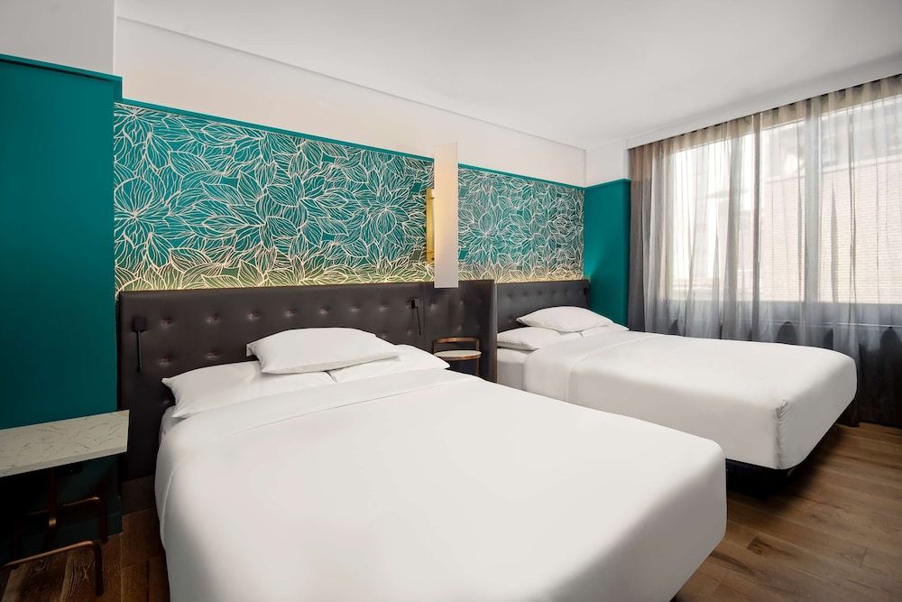 Premium Quadruple Room, 2 Queen Beds, City View