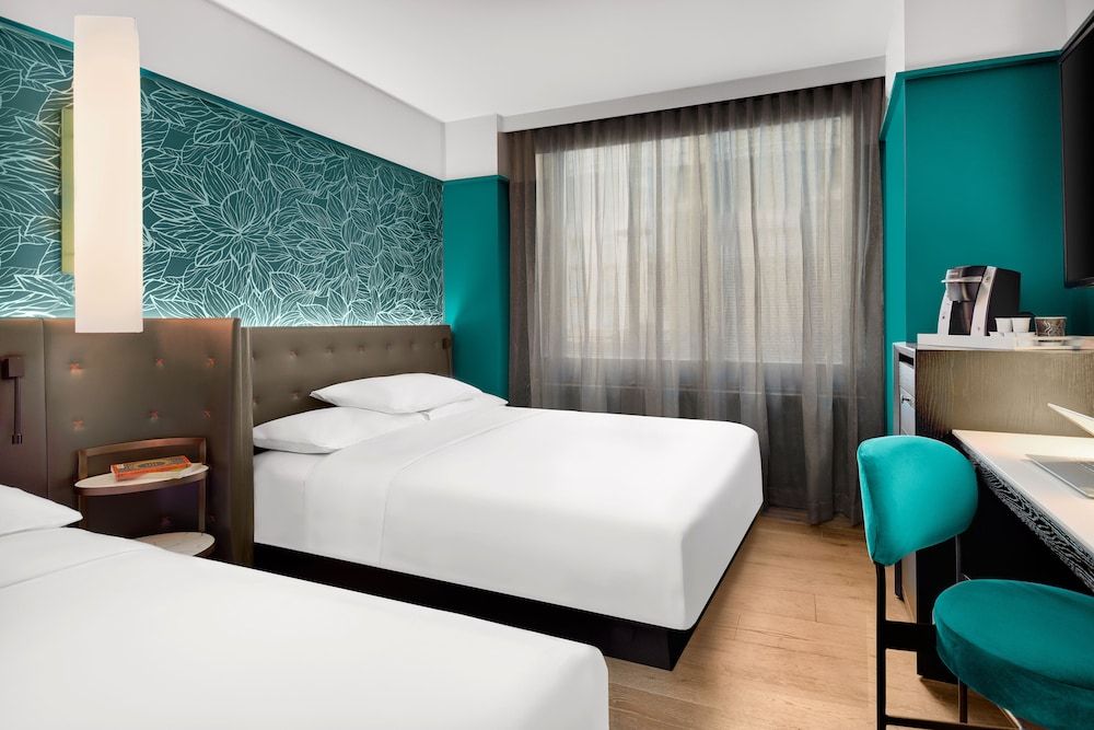 Premium Quadruple Room, 2 Queen Beds, City View