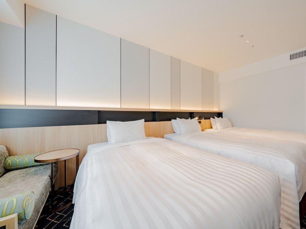 Moderate Twin Room for 3 People with Extra Bed - Non-Smoking