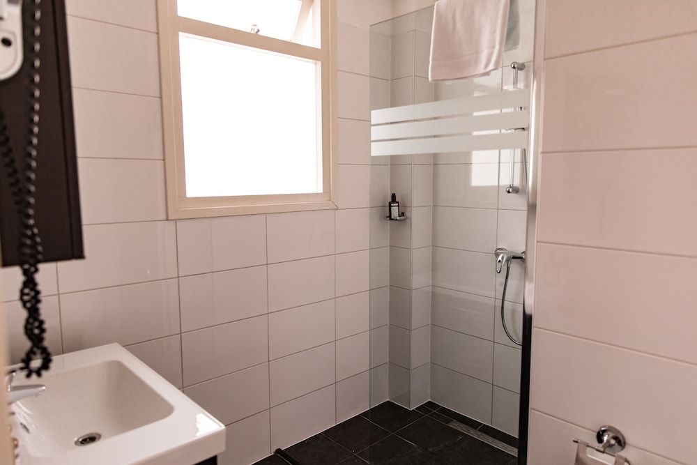 Ambassador City Centre Hotel Comfort Quadruple Room 7