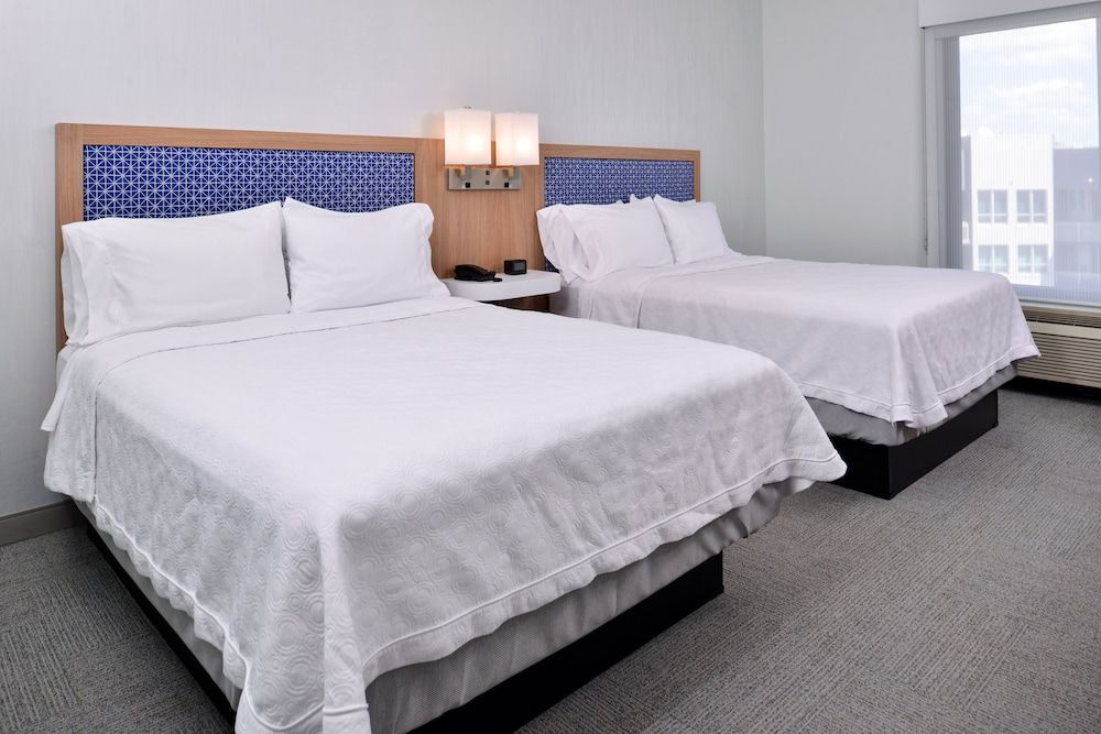 Room, 2 Queen Beds, Refrigerator & Microwave, City View