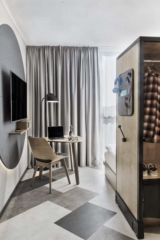 Stay KooooK Bern Wankdorf – Online Check In Studio 8