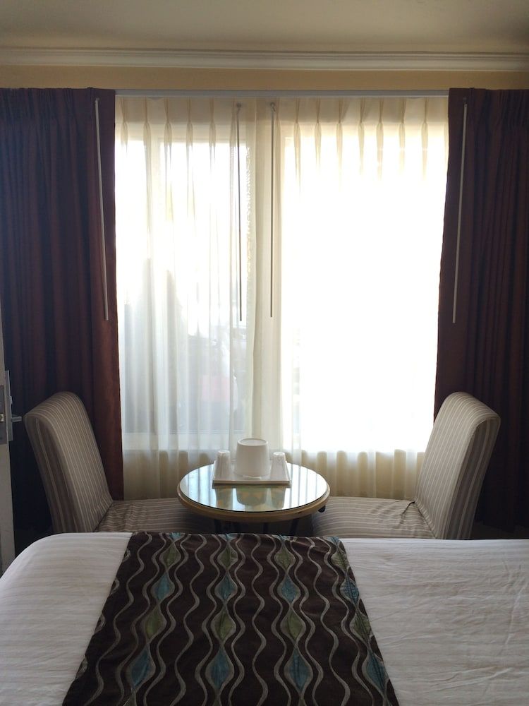 undefined Oasis Inn & Suites 2