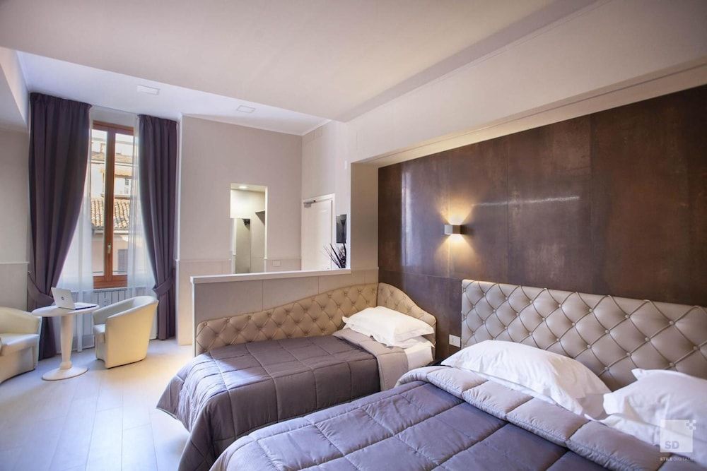 Hotel Cavour Deluxe Triple Room