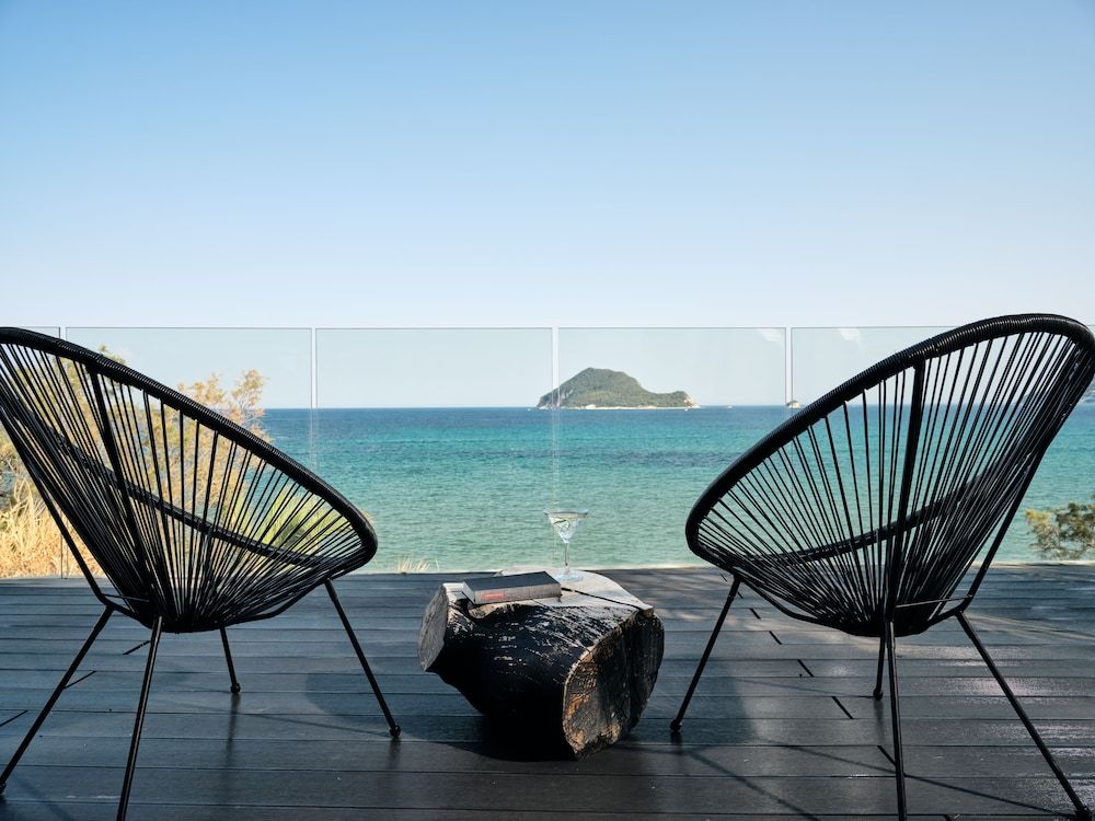 Junior Suite with Outdoor Jetted Tub & Sea View