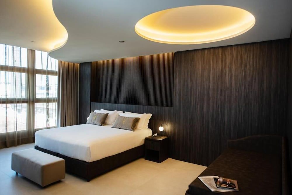 Gold Tower Lifestyle Hotel Deluxe Room 6