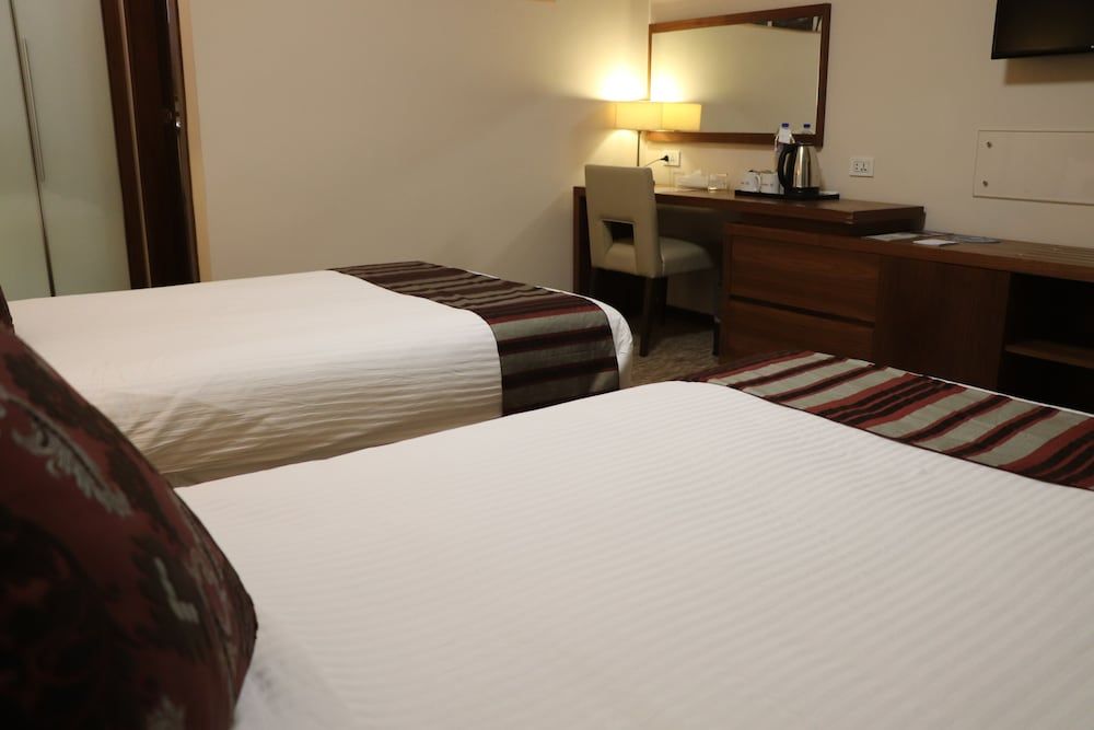 Mamba Point Hotel Standard Twin Room, Multiple Beds, Garden View 5