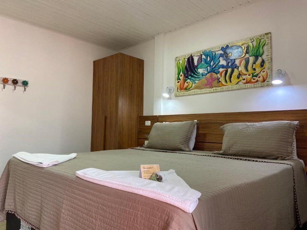 Suite casal luxo com vista ao mar