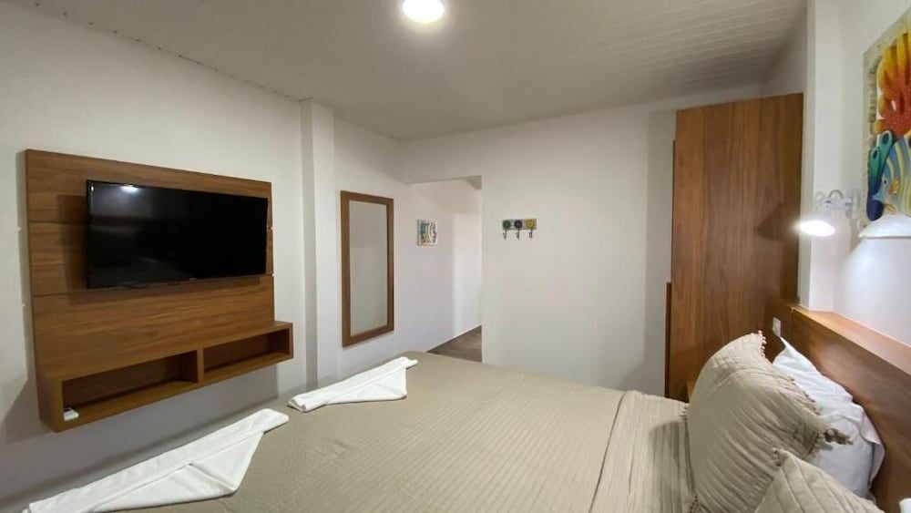 Suite casal luxo com vista ao mar