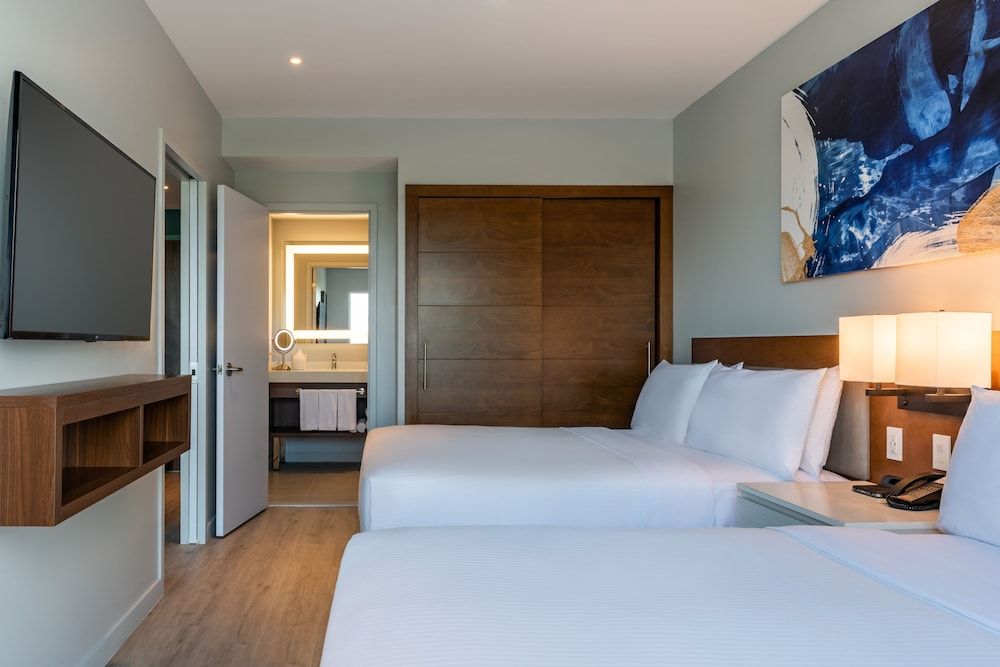 Suite, 2 Queen Beds, Partial Ocean View