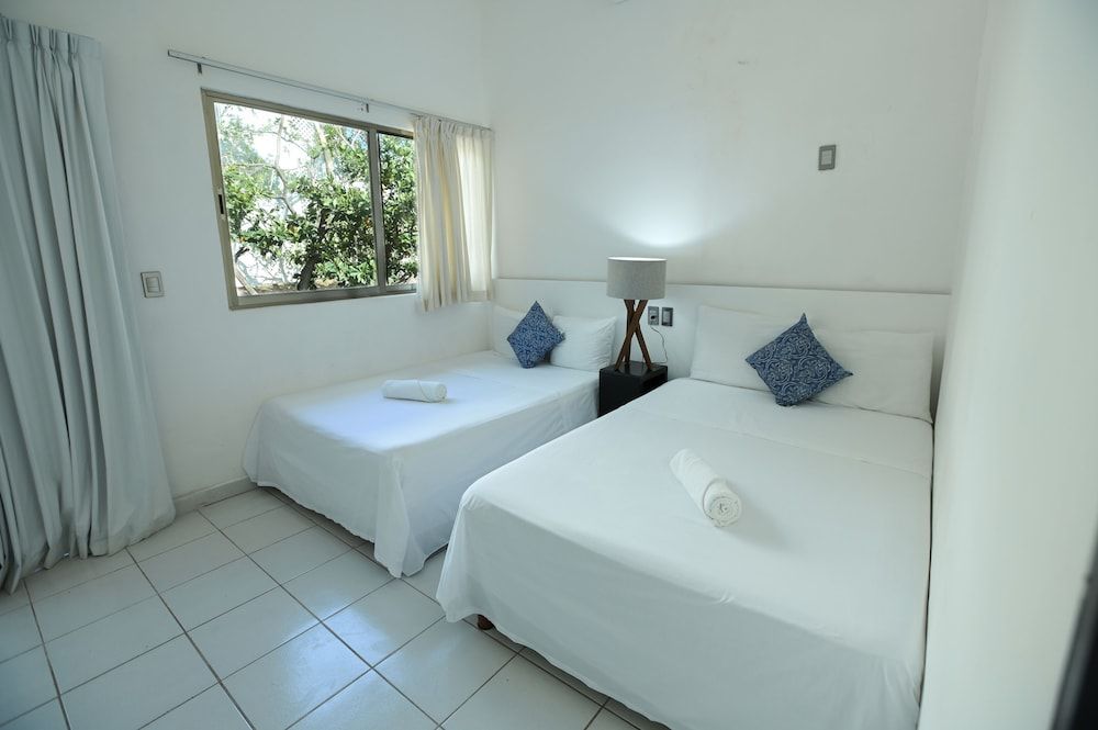 Comfort Room, Patio two double beds