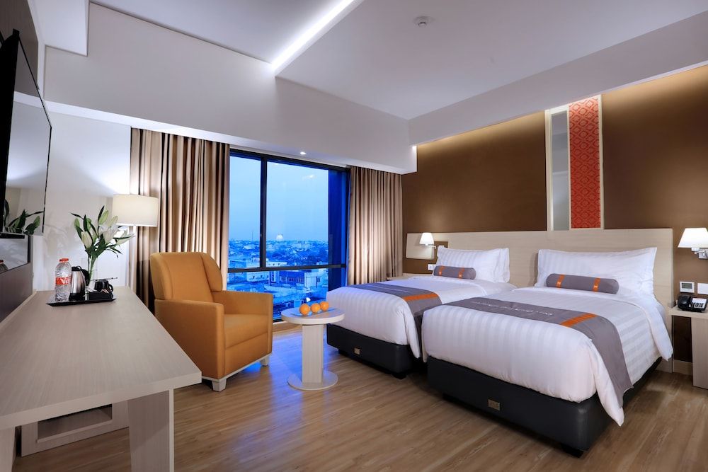 Harper Palembang by ASTON Premier Room (Deluxe) 6