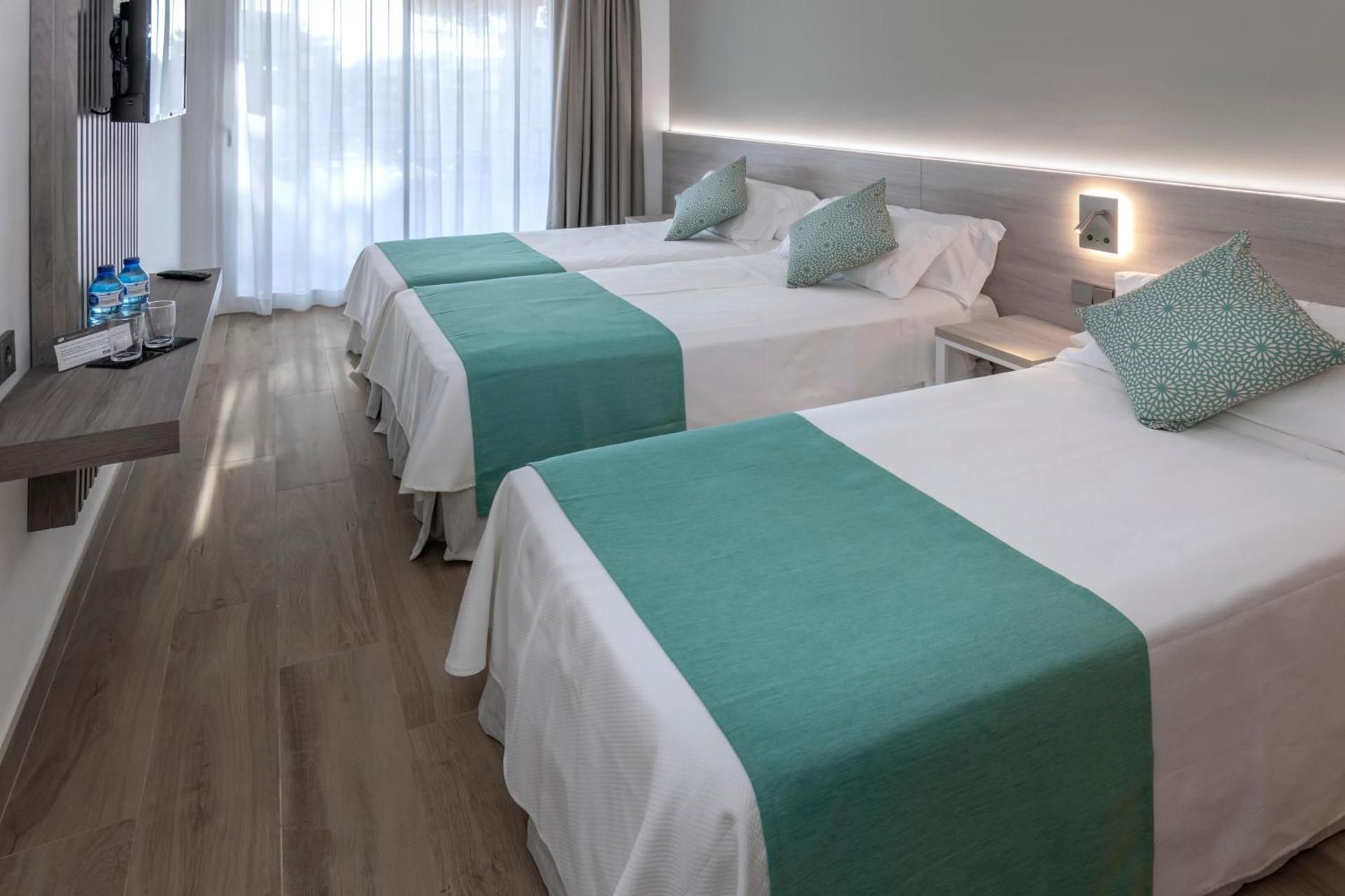 Triple Room with Side Sea View (2 adults + 1 child)