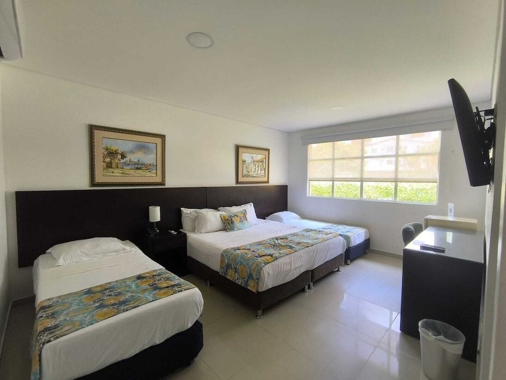 Hotel San Martin Quadruple Room, 1 King Size Bed, 2 Single Beds