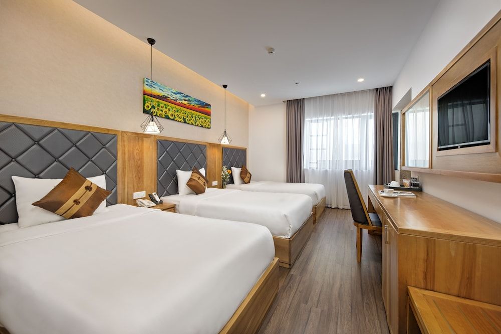 Grand Sunrise Boutique Hotel Deluxe Triple Room 3