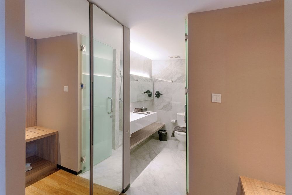 The Zuri Dumai Deluxe Double Room 6