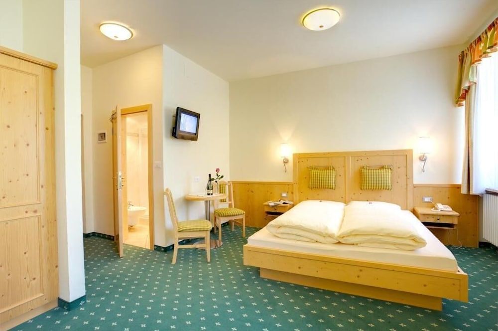 Hotel Castel Latemar Family Quadruple Room 5