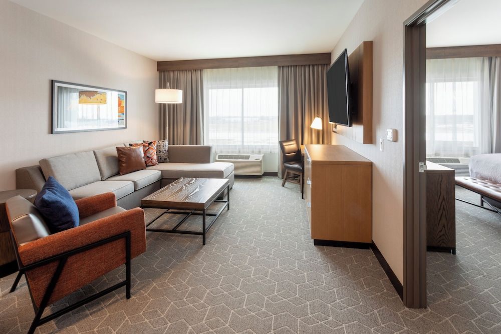 Suite, 1 King Bed, Accessible (Track View, Roll-In Shower)