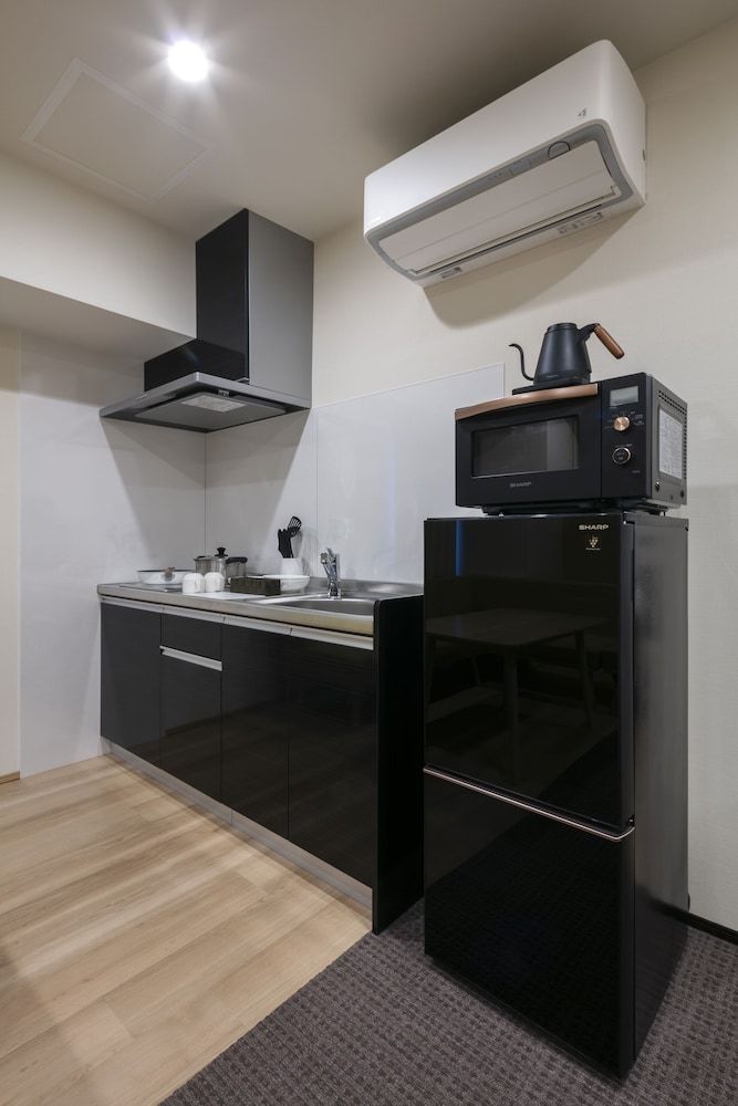 Club Suite, Multiple Beds, Kitchen, City View