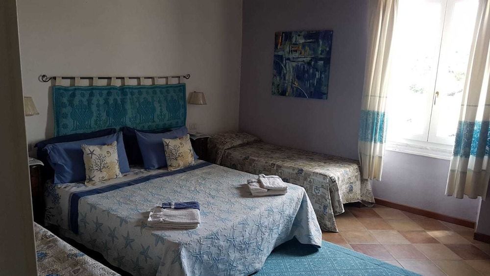 B&B Guest House Il Porto Vecchio Deluxe Quadruple Room 2