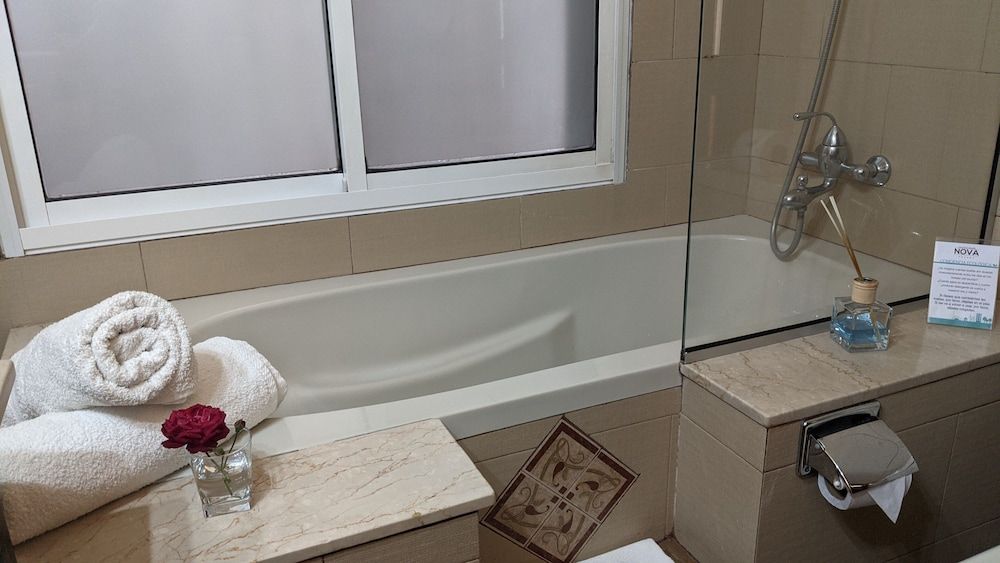 Nova Posada Family Quadruple Room, 2 Bedrooms, Garden Area 6