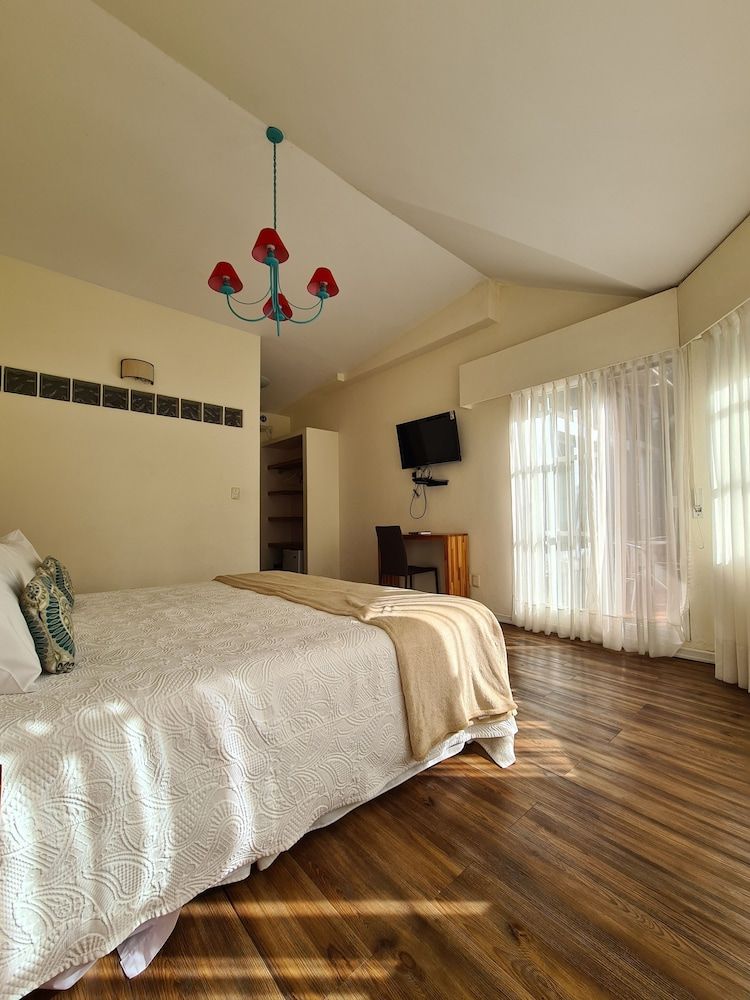 Nova Posada Family Quadruple Room, 2 Bedrooms, Garden Area 3