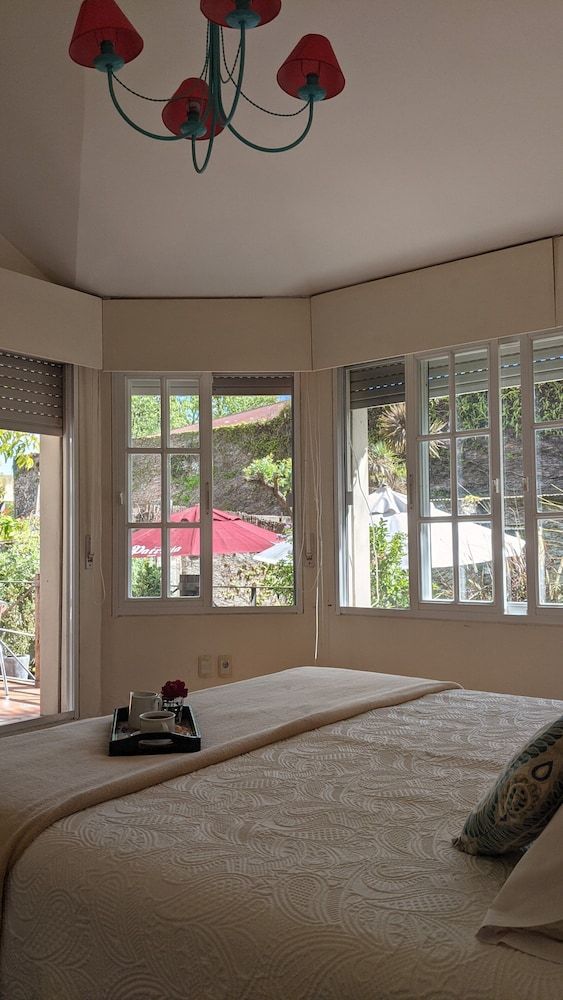 Nova Posada Family Quadruple Room, 2 Bedrooms, Garden Area 9