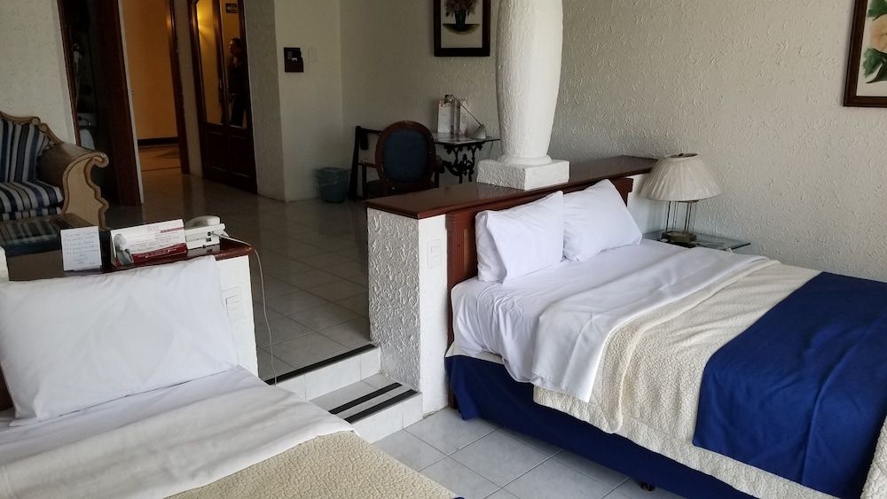 Standard Quadruple Room, 2 Double Beds, Garden View