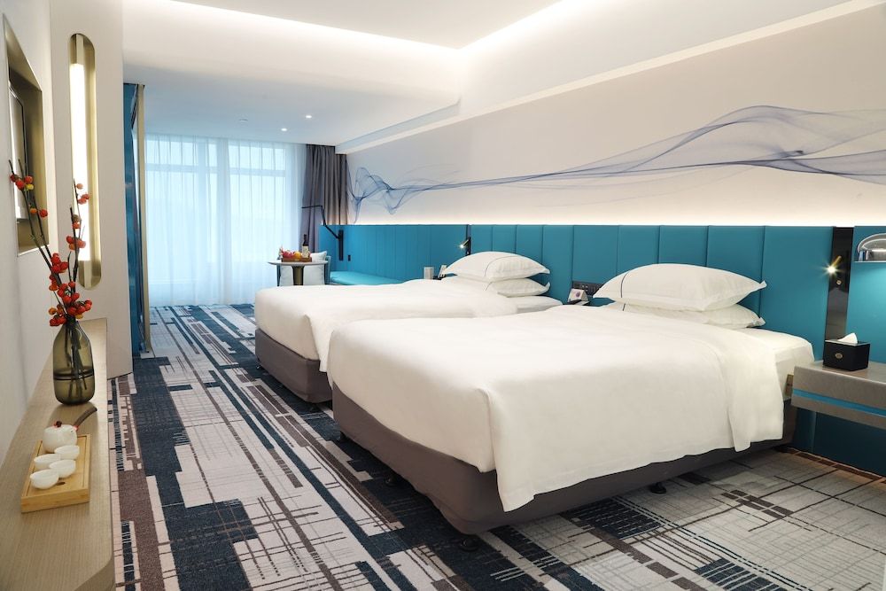Asia International Hotel Guangzhou - Overseas Buyer Registration Services in Hotel & Free Shuttle between Hotel and Exhibition Center during Canton Fair