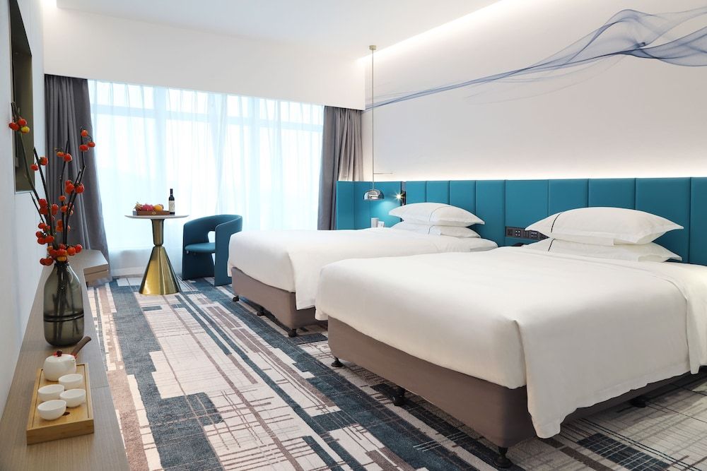 undefined Asia International Hotel Guangzhou - Overseas Buyer Registration Services in Hotel & Free Shuttle between Hotel and Exhibition Center during Canton Fair 2