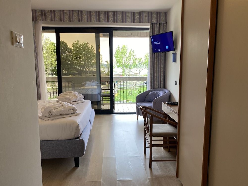 Junior Quadruple Room with Balcony