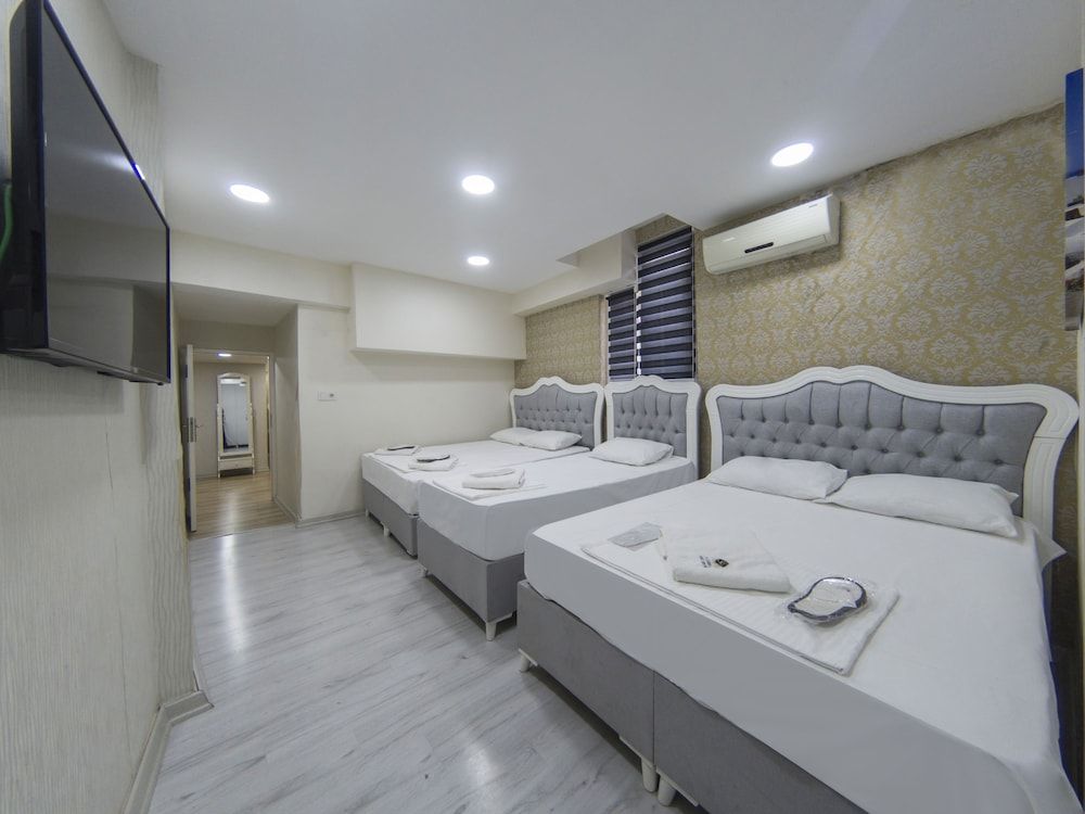Standard Quadruple Room, Multiple Beds, City View