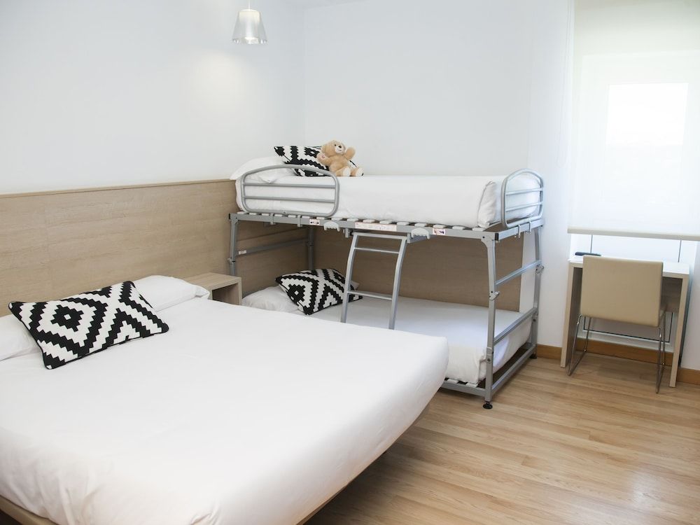 Quadruple Room (2 Adults + 2 Children)