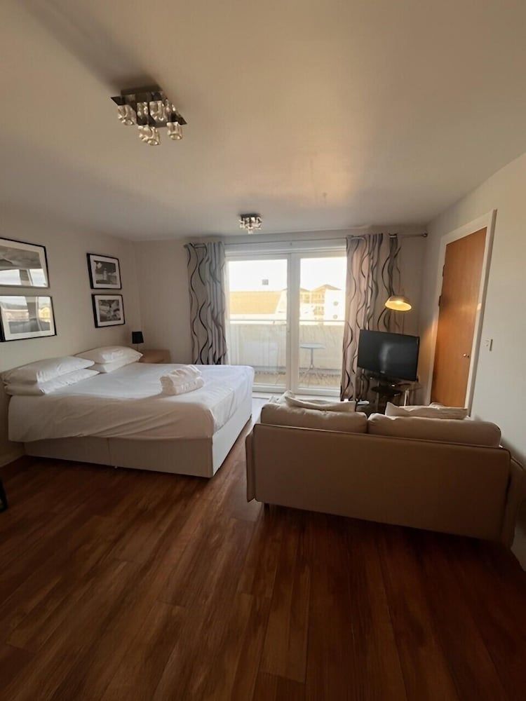 Century Wharf by Urban Space Studio Apartment with Balcony 3