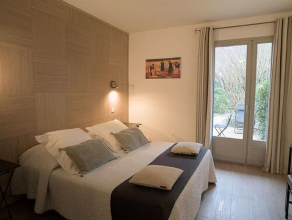 Chambre climatisée lits jumeaux