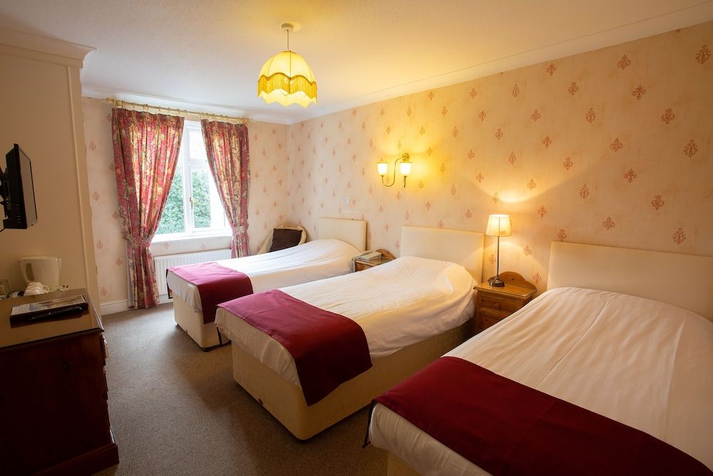 Fines Bayliwick Hotel Standard Triple Room 4