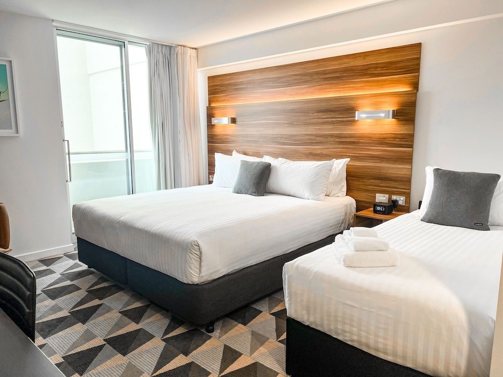 The Gem Hotel Deluxe Triple Room