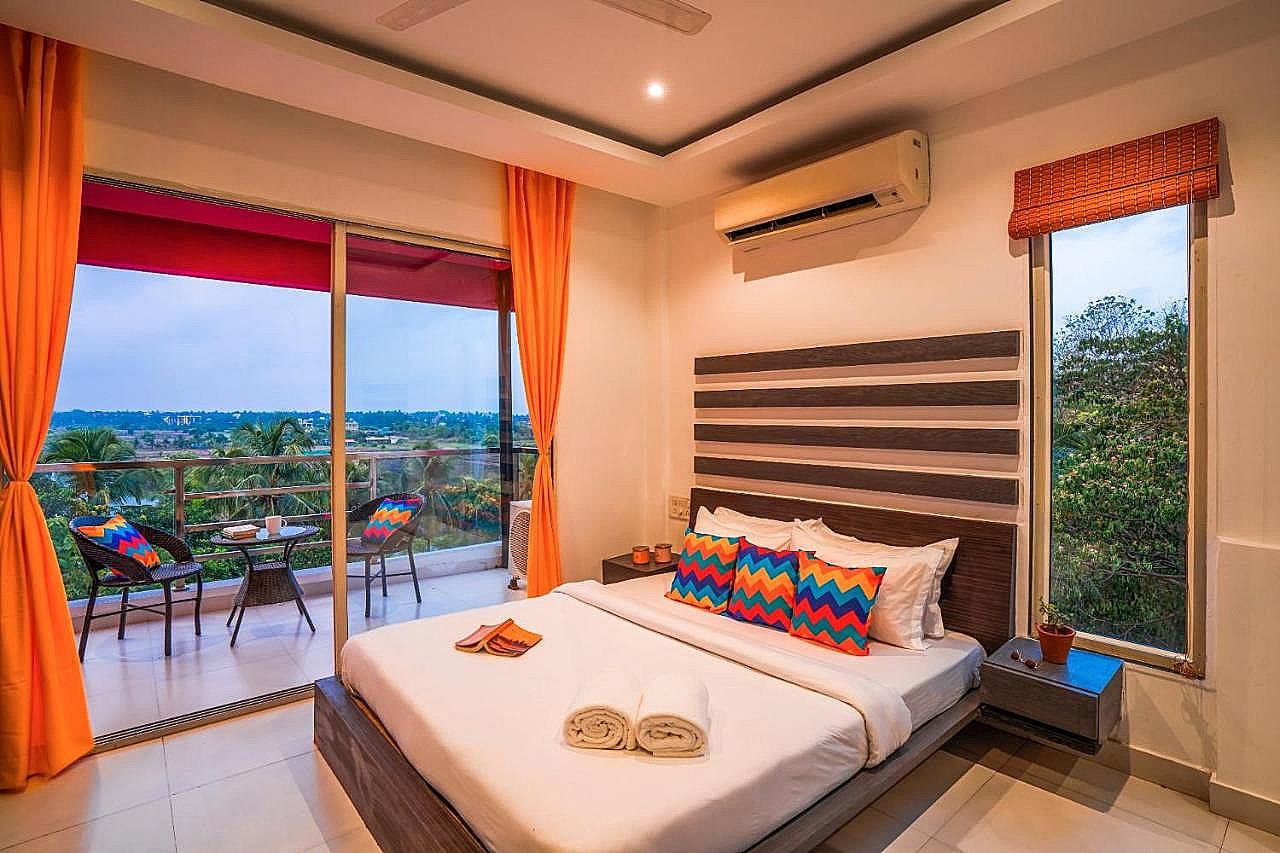 goSTOPS Goa Baga Deluxe Double AC Room with Balcony, Ensuite Bathroom