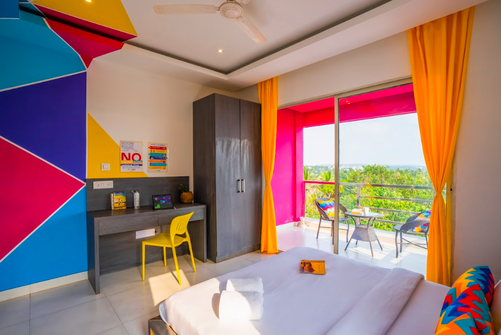 goSTOPS Goa Baga Deluxe Private A/C Room with Balcony and Ensuite Bathroom 11
