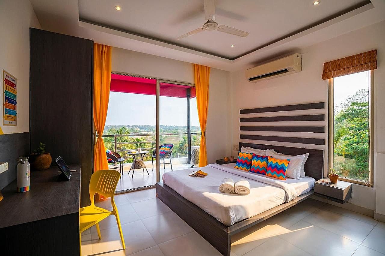 goSTOPS Goa Baga Deluxe Double AC Room with Balcony, Ensuite Bathroom 4