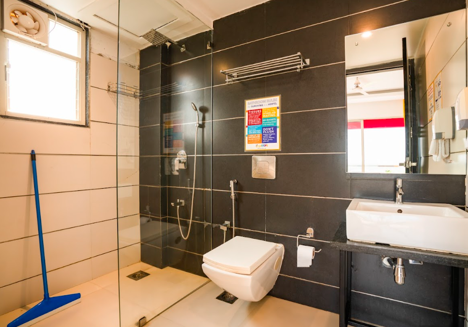 goSTOPS Goa Baga Deluxe Private A/C Room with Balcony and Ensuite Bathroom 8