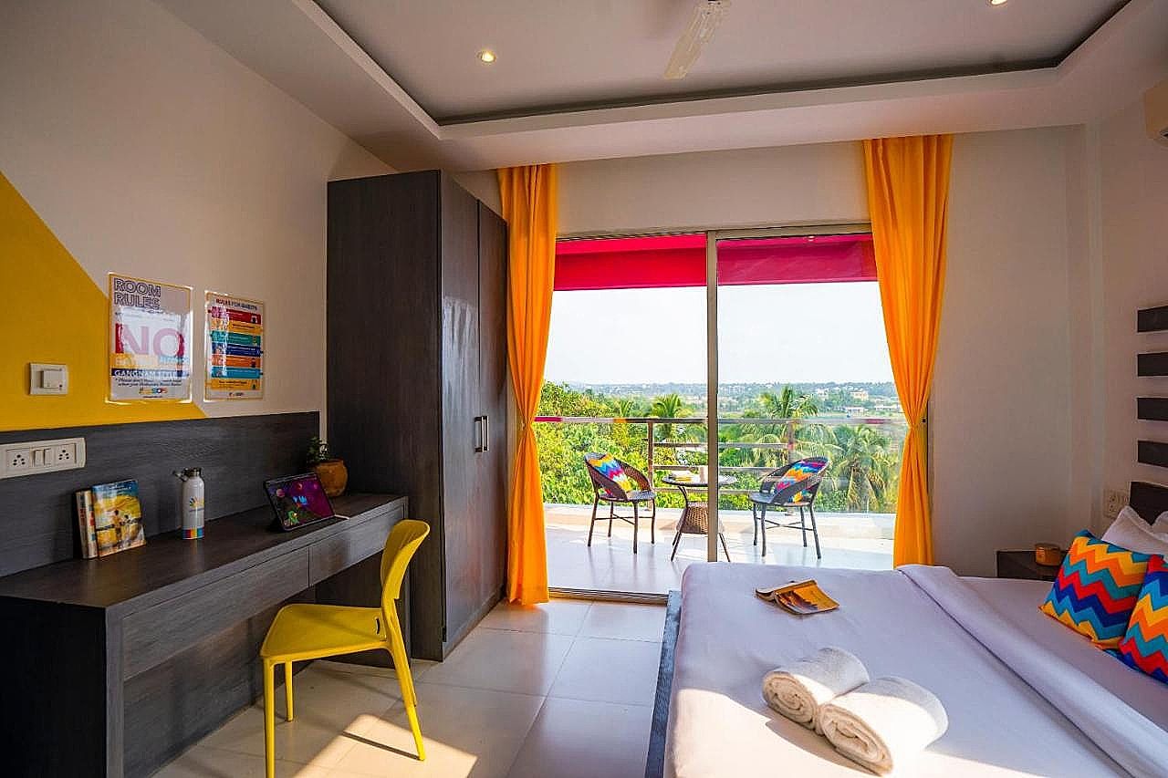 goSTOPS Goa Baga Deluxe Double AC Room with Balcony, Ensuite Bathroom 3