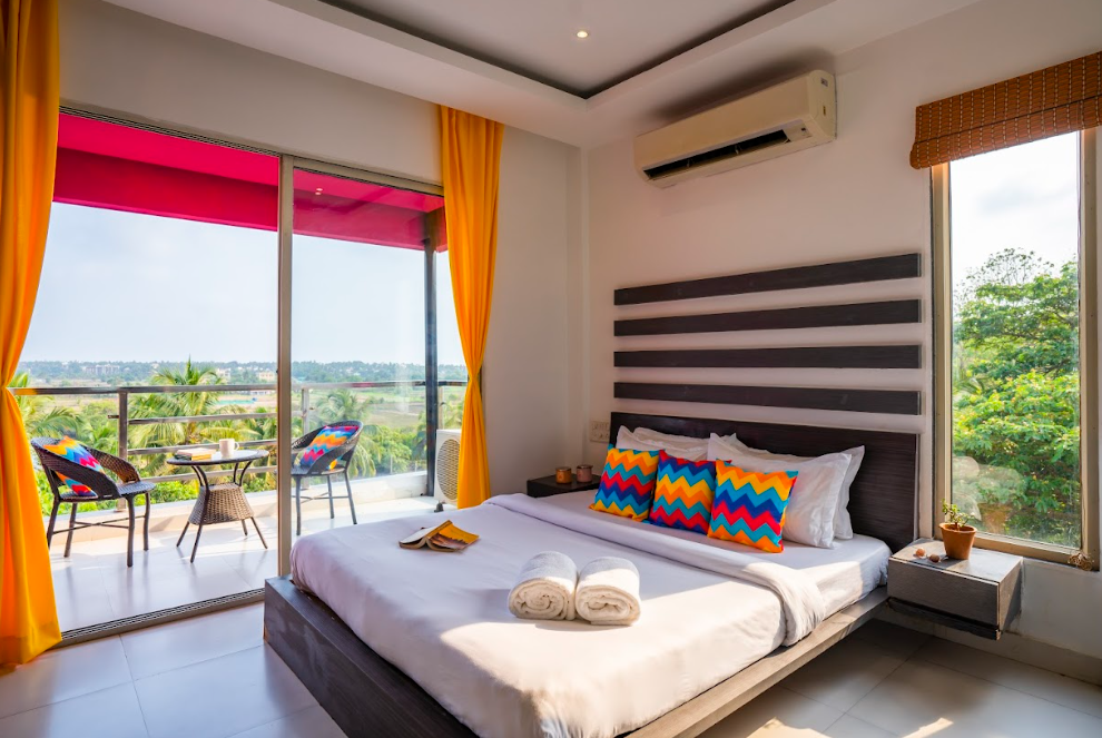 goSTOPS Goa Baga Deluxe Private A/C Room with Balcony and Ensuite Bathroom 7
