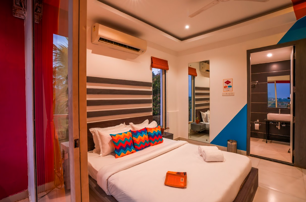 goSTOPS Goa Baga Deluxe Private A/C Room with Balcony and Ensuite Bathroom