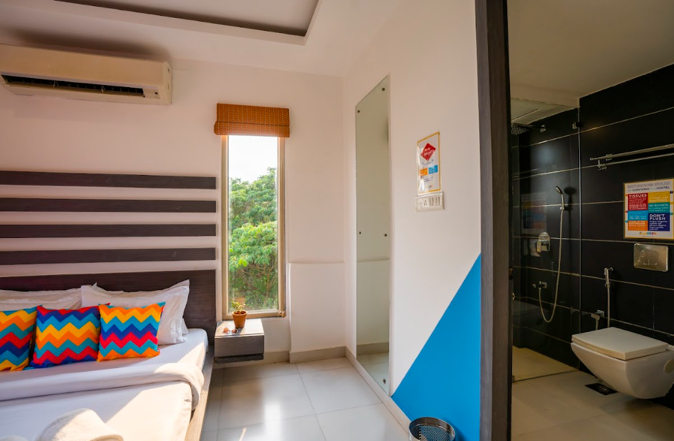 goSTOPS Goa Baga Deluxe Private A/C Room with Balcony and Ensuite Bathroom 3