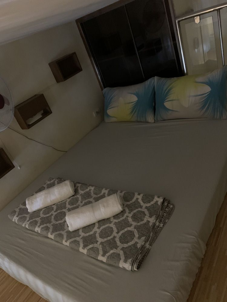 HnM Management - One Palm Tree Villas