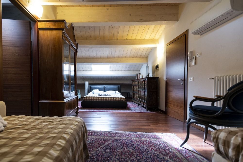 Al Battistero Luxury Suite Deluxe Quadruple Room 5